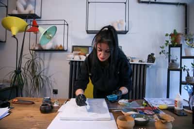 Image for From urn to canvas: Turkish artist used ashes for portrait of deceased