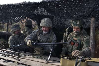 Image for Ukraine says it pulled back troops from southeastern village, stopped Russian advance