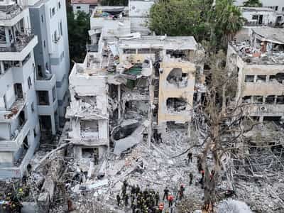 Image for War-weary Gazans share images of destruction in Israel