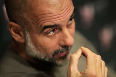 Image for Exclusive-Soccer-Man City's third-placed finish may be better achievement than title win, Guardiola says
