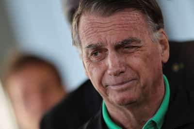Image for Brazil's top court orders raids on Bolsonaro; Washington revokes judge's visa