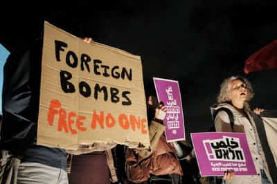 Image for Israelis oppose Iran ceasefire, divided over whether to respect it, poll says