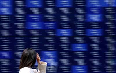 Image for Stocks mixed, yields rise ahead of US jobs data; defense shares climb