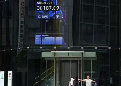 Image for Shares trade near record highs, crude prices gain nudged by Middle East ceasefire