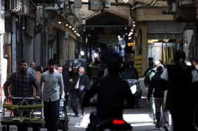 Image for War hits Tehran’s grand bazaar as prices surge and shops shut