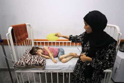 Image for Gaza mother worries time running out for evacuation of malnourished daughter
