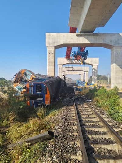Image for At least 25 killed after crane falls on train in Thailand, police say