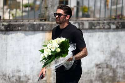 Image for Carrying red wreath, Liverpool players join family for Diogo Jota's funeral