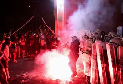 Image for Serbian police use teargas to disperse anti-government protesters