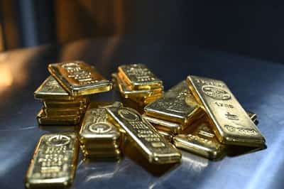 Image for Gold falls as investors take profits after record high