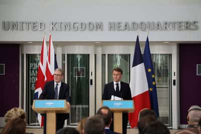 Image for Britain says first migrant returned to France under 'one in, one out' deal