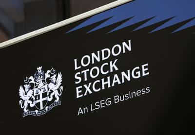 Image for FTSE 100 ends at record high, boosted by oil and earnings