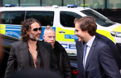 Image for Comedian Russell Brand denies rape and sex assault charges in UK court