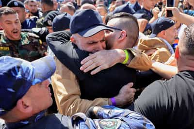 Image for Palestinians cheer as freed prisoners begin to arrive home under ceasefire deal