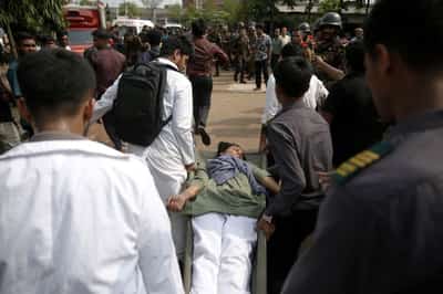 Image for Students protest in Bangladesh after air force jet crash kills 31, mostly children