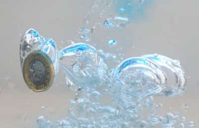 Image for Sterling treads water as data paints sombre picture before budget