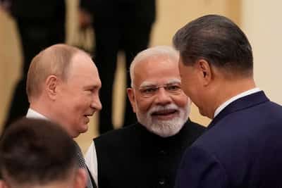 Image for Analysis-As Trump chills US-India ties, Modi warms to China and Russia