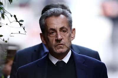 Image for France's Sarkozy back home after court frees him pending appeal