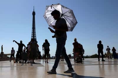 Image for France shuts schools as heatwave grips Europe, sea off Spain at record high temperatures