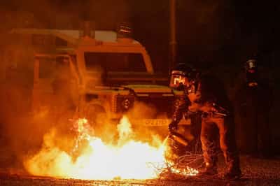 Image for Police attacked as Northern Irish violence spreads to another town