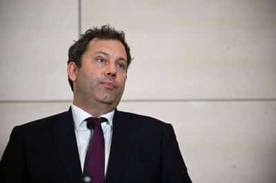 Image for Top German minister departs for China seeking dialogue on trade tensions